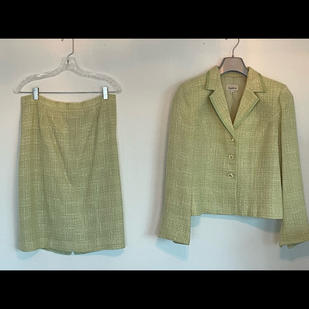 Beautiful women’s suit. Size 10. Made in Canada. Dry clean only. No pockets.